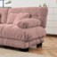 Canapé confortable en chenille avec plusieurs coussins et repose-pieds pour le salon-597448109