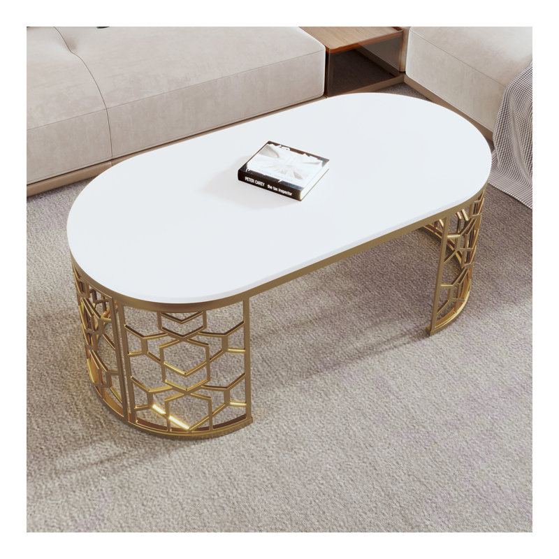 Table basse moderne ovale avec structure en acier inoxydable