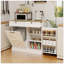 Modern Kitchen Trash Can Storage Cabinet with Tilt-Out Bin, Drawers, and Shelves for Efficient Organization