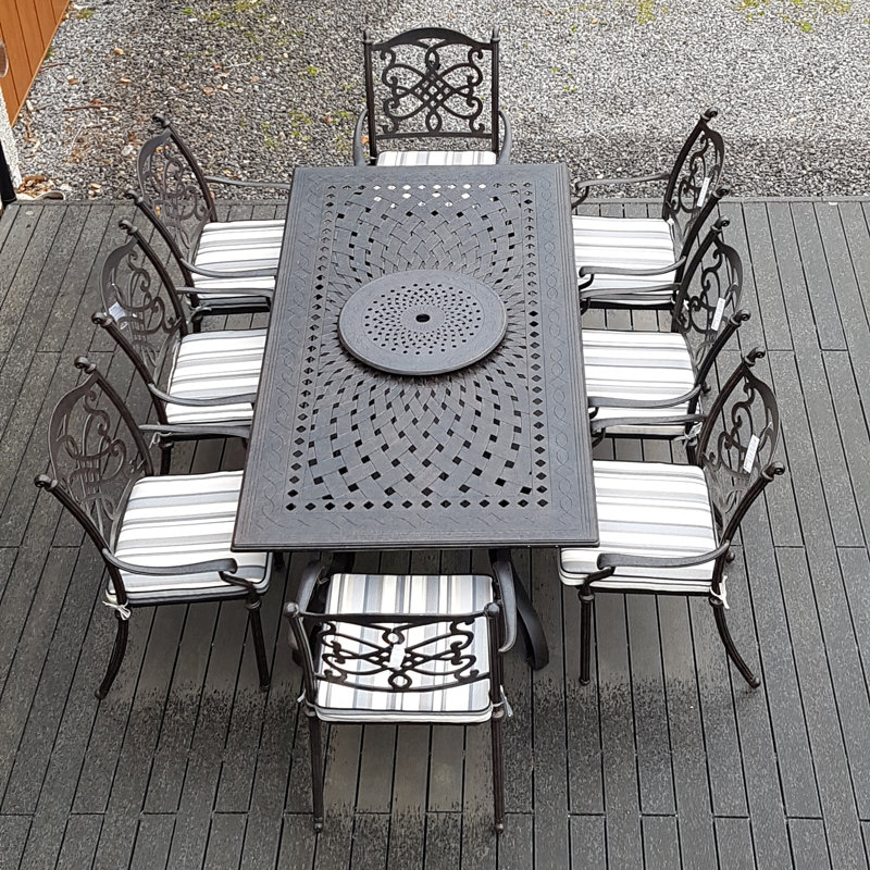 Canouan 8 - Person Patio Dining Set with Rectangular Table , Cushions Included