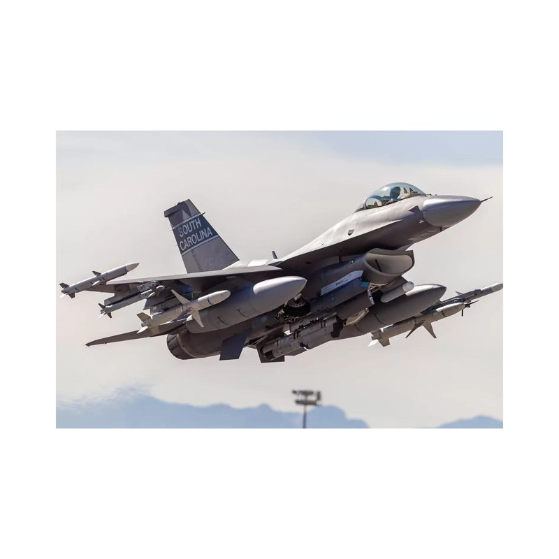 A US Air Force F-16C Fighting Falcon Takes Off From Nellis Air Force Base, Nevada by Rob Edgcumbe - Wrapped Canvas Print