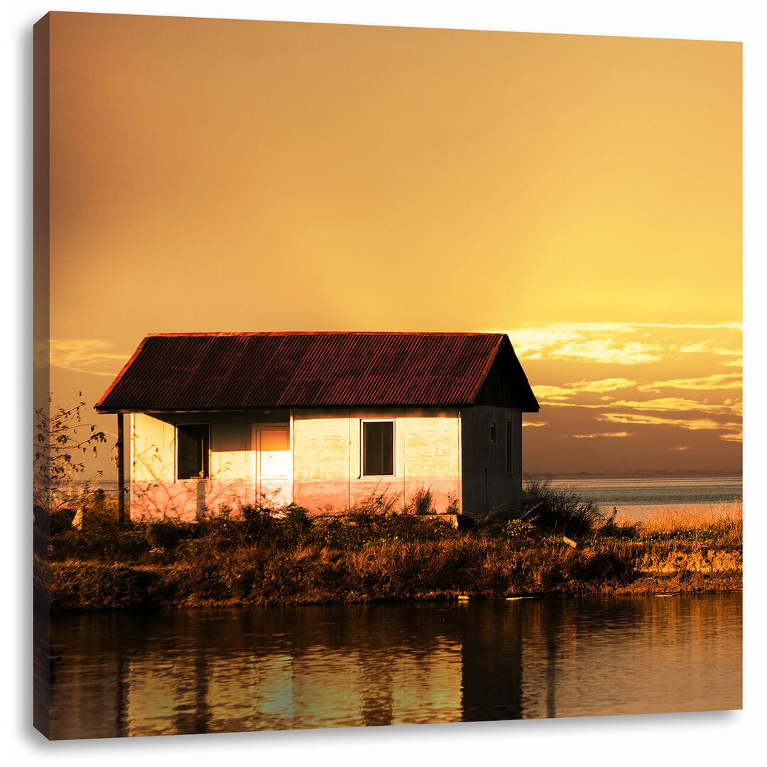 Leinwandbild Haus am See bei Sonnenuntergang