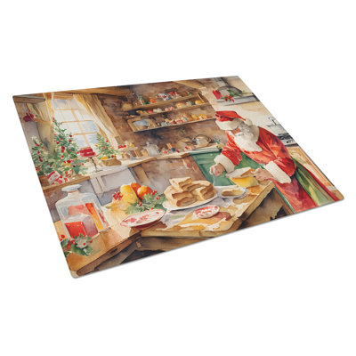 Planche à découper en forme de biscuits avec père Noël