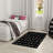 Tapis noir Arranjeet-107264577