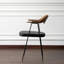 Chaise moderne et simple à dossier courbé en bois massif