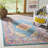Felty Oriental Light Blue/Orange Area Rug-1598703060
