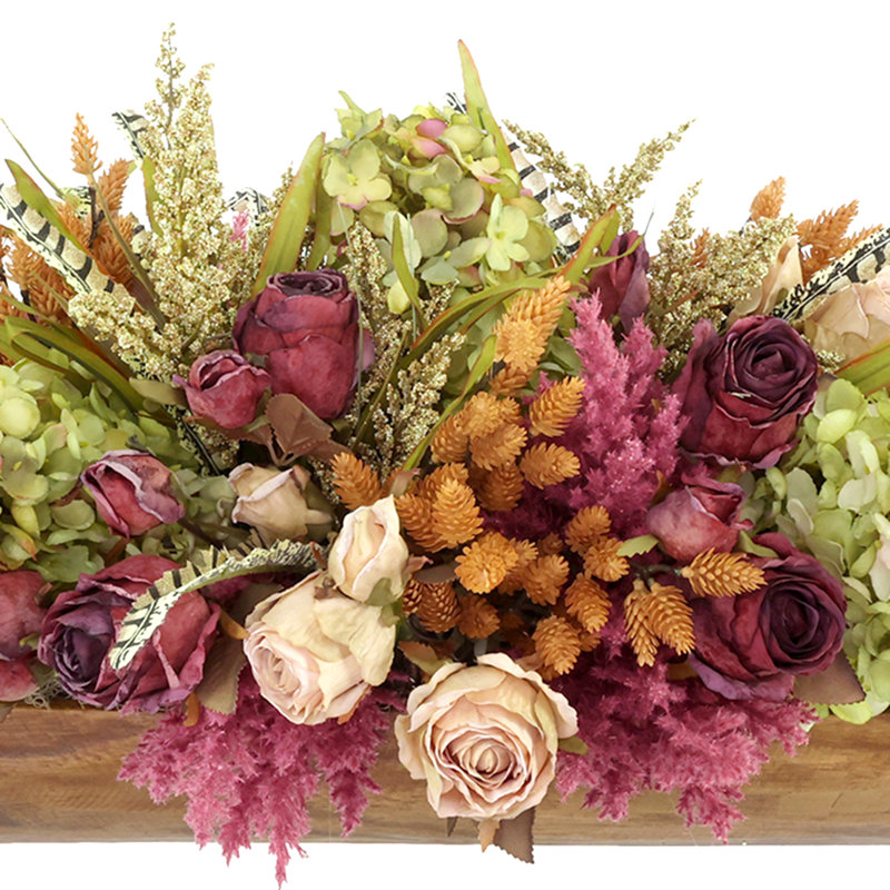 Centre de table d'automne avec hortensias et roses