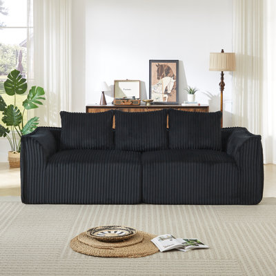 Minimalist 3-seater corduroy sofa featuring curved lines and a gently sloped backrest, comes complete with three throw pillows,Horn-Shaped Throw Pillow black