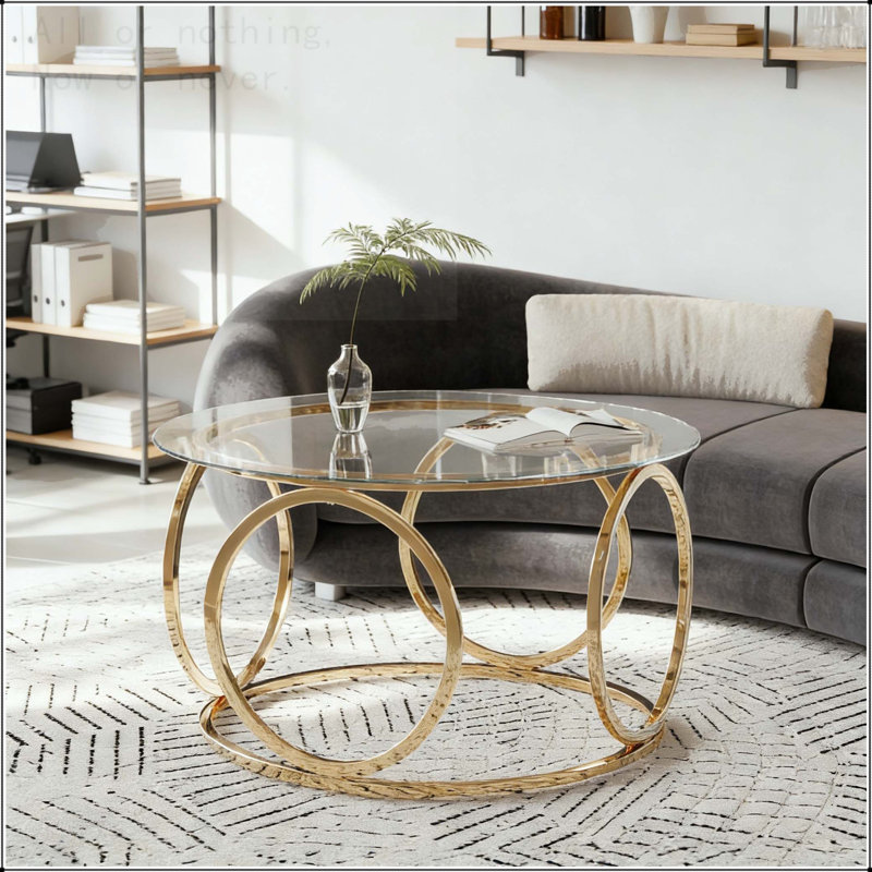 Table basse ronde moderne en verre avec cadre circulaire doré