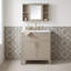 Meuble-lavabo autoportant avec lavabo en céramique, tablette réglable, portes à fermeture en douceur et supports de porte de rangement