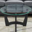 Table basse ovale en verre 48 pouces avec cadre noir-550113903