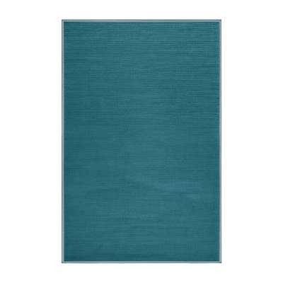 Tapis bleu uni lavable à la machine
