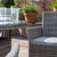 Dubose 4 - Person Wicker Patio Dining Set with Round Table , Cushions Included-37961051