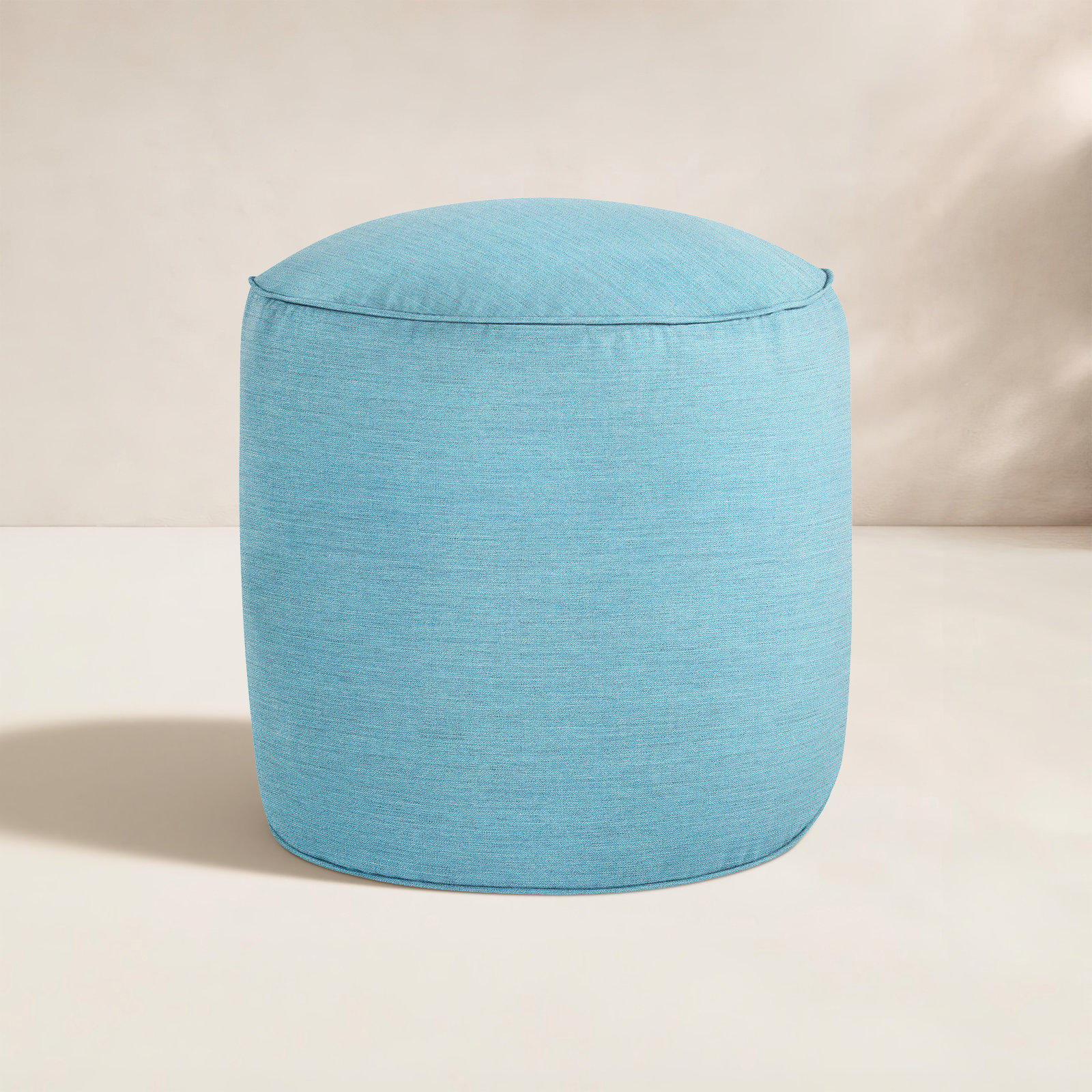Demi Round Upholstered Outdoor Ottoman with Sunbrella® Cushion, Cast Horizon Sunbrella® Plainweave