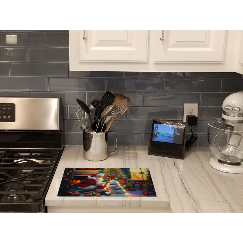 American Eskimo and Santa Claus Glass Cutting Board