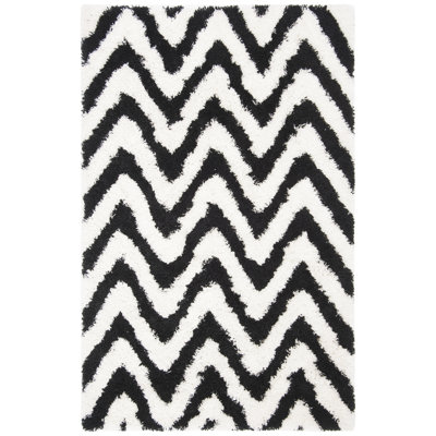 Delane Handmade Shag Black/White Area Rug