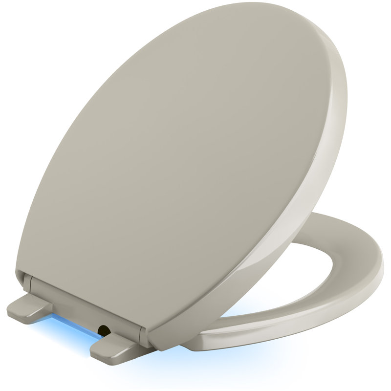Reveal Nightlight Quiet-Close with Grip-Tight Round-Front Toilet Seat, Sandbar