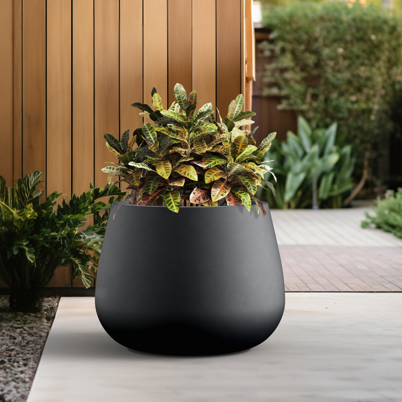 Pot à fleurs en béton