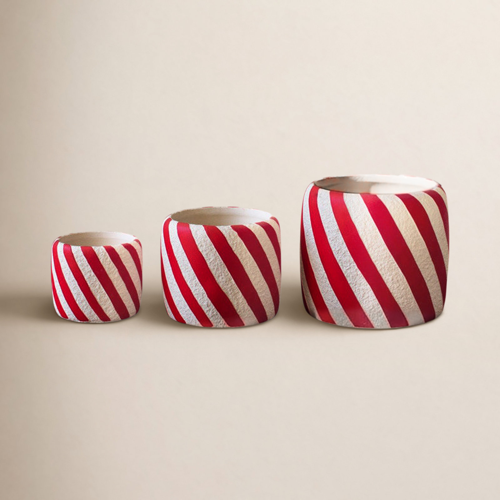 SET OF THREE CONCRETE CANDY CANE PLANTERS