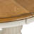 Cleckheat Pedestal Dining Table w/ 12" Leaf