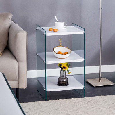 Trois niveaux de tables de chevet. La surface du panneau est en panneau de fibres à densité moyenne, avec des autocollants à grain de bois, et les deux côtés sont en verre trempé transparent. La conception est simple et généreuse, avec fonction de