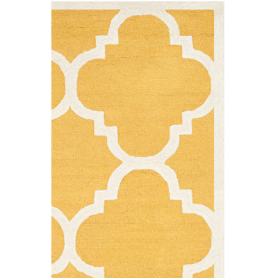 Tapis doré / ivoire en laine touffeté à la main à motif géométrique Cannen