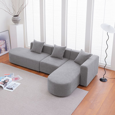 Canapé modulaire moderne avec siège courbé (faisant face à la droite) - Revêtement Boucle en L gris avec siège à droite, gris. Revêtement, structure en bois et en métal. Siège confortable, installation facile. 107,1 po P 60,16 po