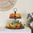 Rustic Farmhouse Wooden Brown 2 Tiered Tray with Metal Handle and Distressed Bead Garland
