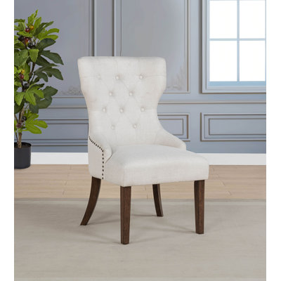 Chaise de salle à manger rembourrée en tissu Wandie crème et chêne foncé