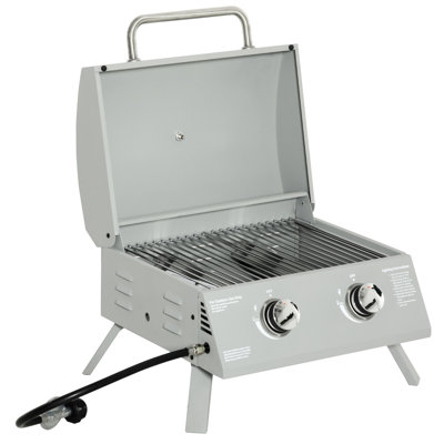 Barbecue à gaz portatif de table, 2 brûleurs. Gris. Pieds pliables. Parfait pour le camping, les pique-niques et le jardin. Couvercle, thermomètre et bac à graisse inclus. Dimensions : 55,2 cm (L) x 46,4 cm (l) x 41,3 cm (H).