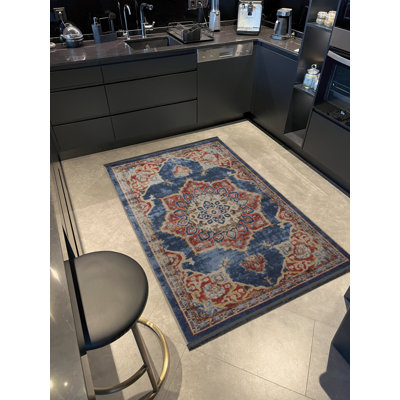 Tapis décoratif bleu à motif floral
