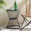 Table d'appoint en fer thermolaqué avec forme de sablier et conception de cage ouverte-27764950