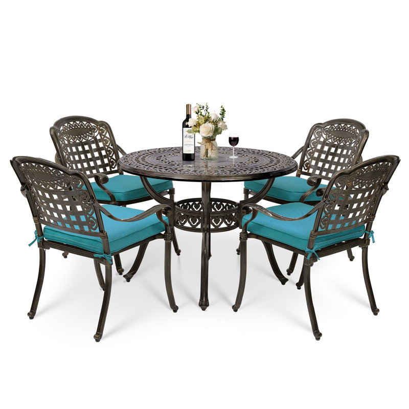 4 - Person Patio Dining Set with Round Table , Cushions Included, Ocean Blue