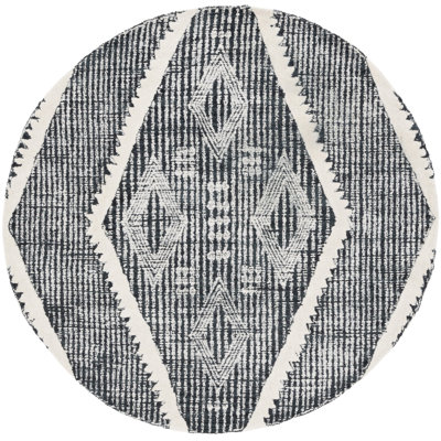 Jarexy Hand Tufted Wool/Cotton Southwestern Rug in Ivory/Black