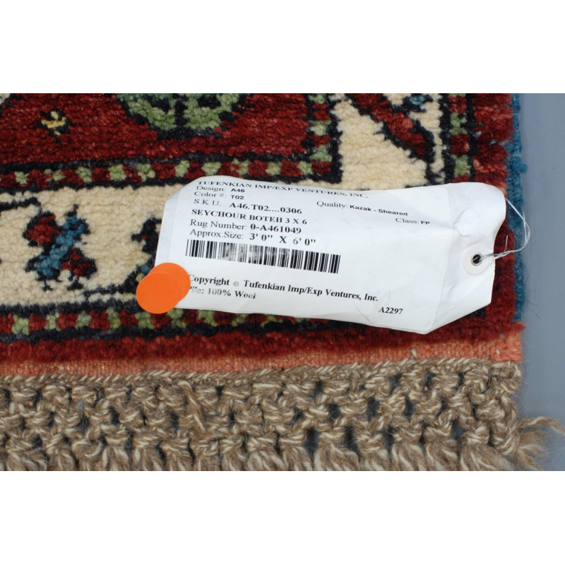 Seychour Wool Oriental Area Rug in Green/Red