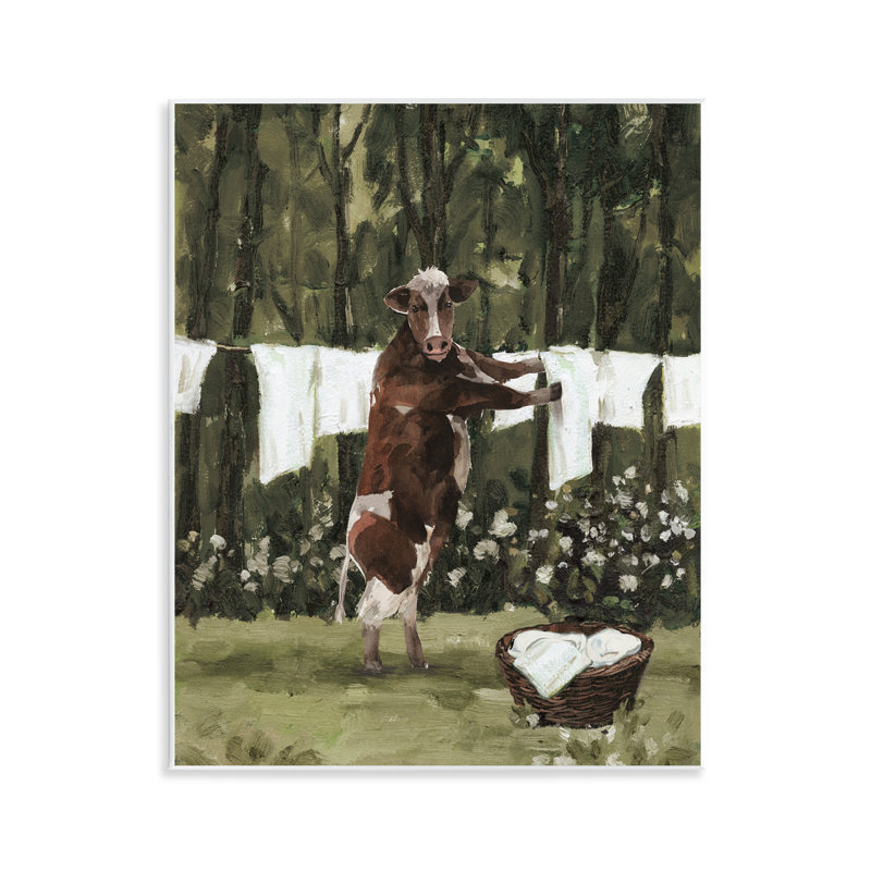 Vache faisant la lessive, art mural par échelle blanche