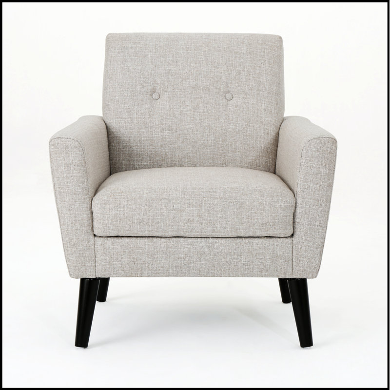 Fauteuil club rétro vintage avec coiffes cloutées et accoudoirs subtils à volutes, parfait pour les intérieurs contemporains.