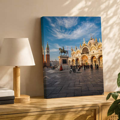 Canvas A Vibrant Scene Set In A Historic Venetian Square Featuring Wall Art A Majestic Bronze Equestrian Statue Atop A Stone Pedestal Canvas Wall Art