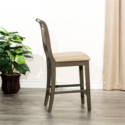 Tabouret de comptoir au fini gris patiné, siège en cuir français avec dossier confortable