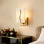 1-Light Armed Wall Sconce Gold Accent with White Faux Marble Pattern