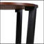 Table d'appoint en bois massif d'acacia avec plateau circulaire et base minimaliste, parfaite pour un décor moderne et naturel.