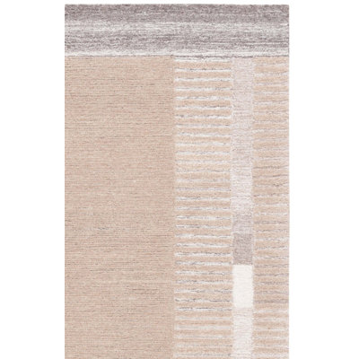 Tapis ivoire / beige en coton touffeté à la main Alysandra