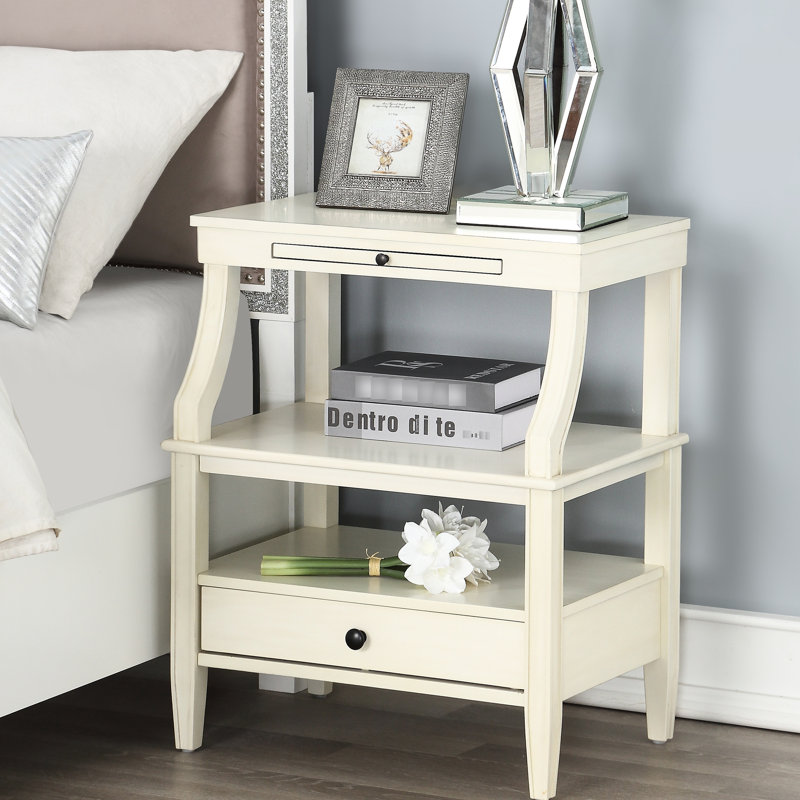 Table de chevet blanche exquise exquise avec de charmantes options de rangement dans la chambre à coucher