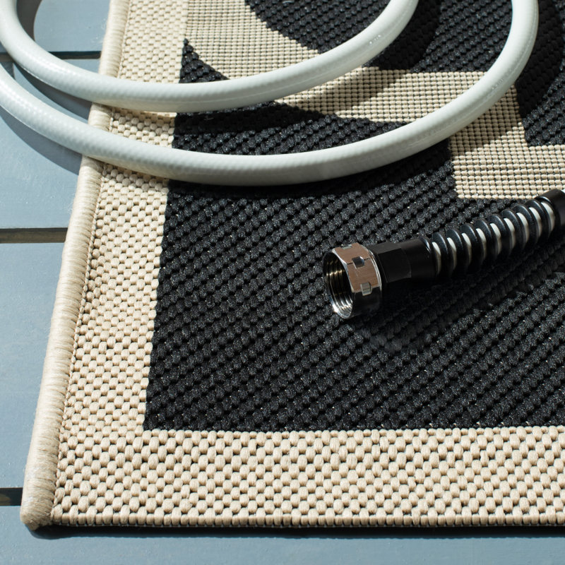 Joyner Geometric Hand Woven Indoor / Outdoor Area Rug, Rectangle 160 x 231 cm