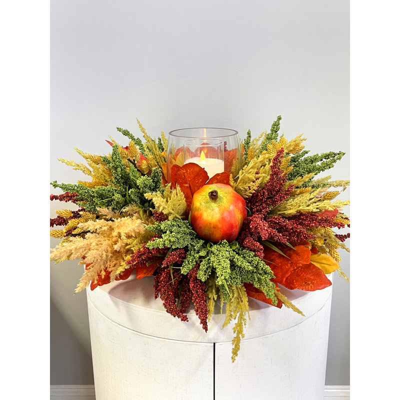 Bougeoir d'automne avec bruyère, pampas et grenades