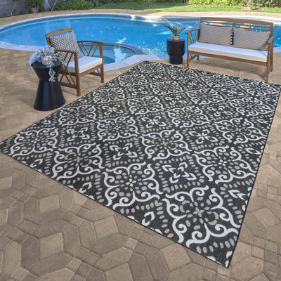 Tapis d'intérieur / extérieur à motif de médaillon transitionnel noir / blanc Paseo Glaudia