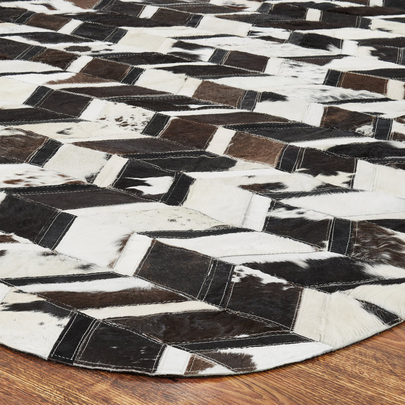 Brooksie Cowhide Geometric Area Rug in Brown/White, Novelty 2' x 3'