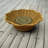 A Handcrafted Woven Storage Tray in a High-Foot Wave Shape, Featuring a Bohemian Pattern-125971420