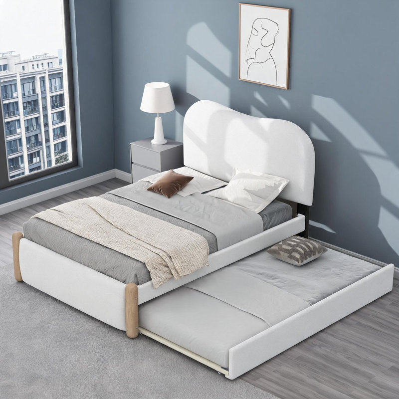 Lit plateforme tapissier de couleur blanche avec lit gigogne escamotable pour la nuit des invités, tête de lit courbée de style moderne pour les chambres à coucher