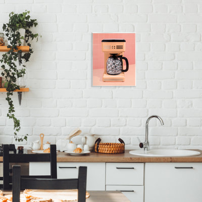 Plaque murale orange sur une machine à café disco, design par Lish Creative